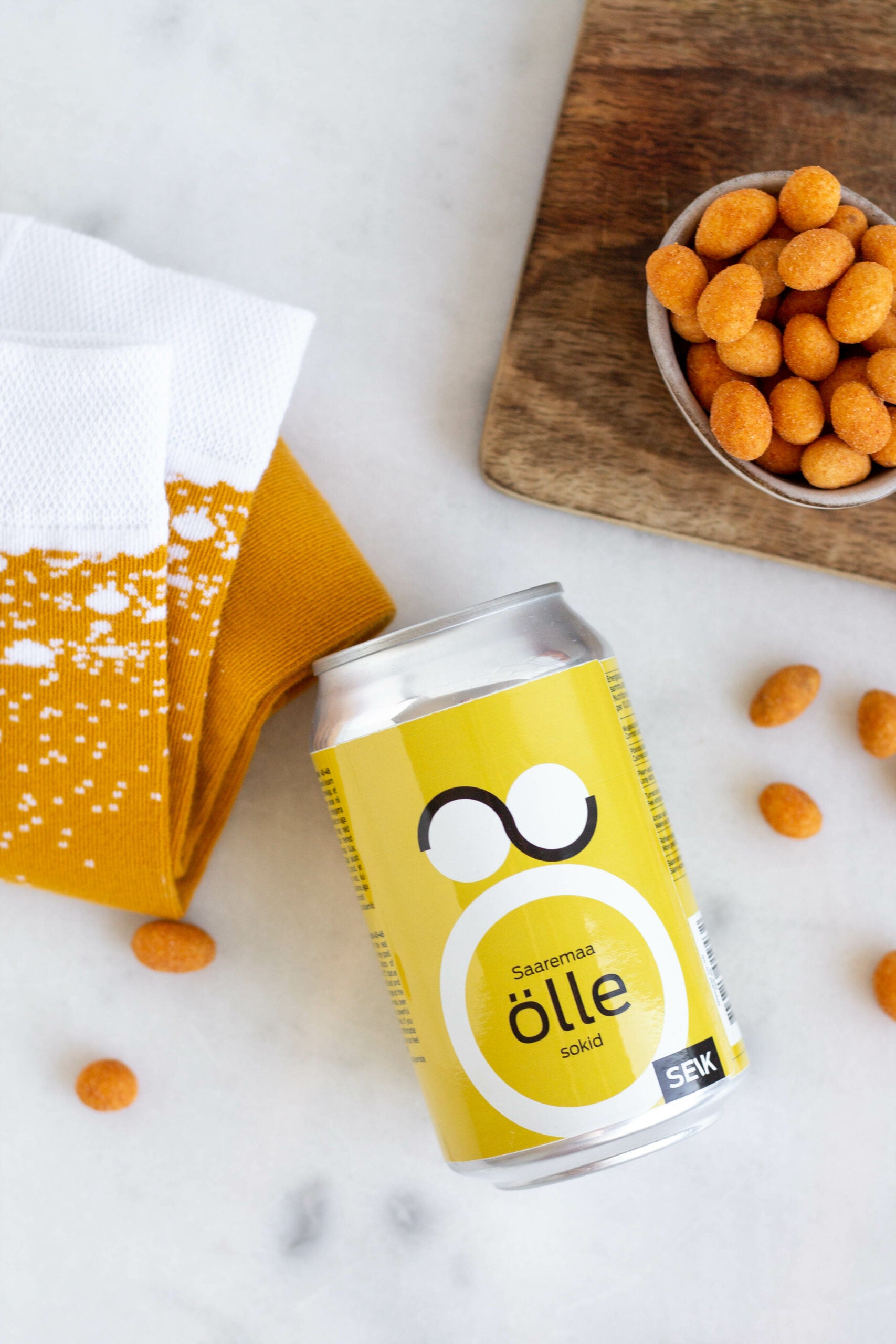 a playful close-up of saaremaa beer socks on feet, ready for a fun night out