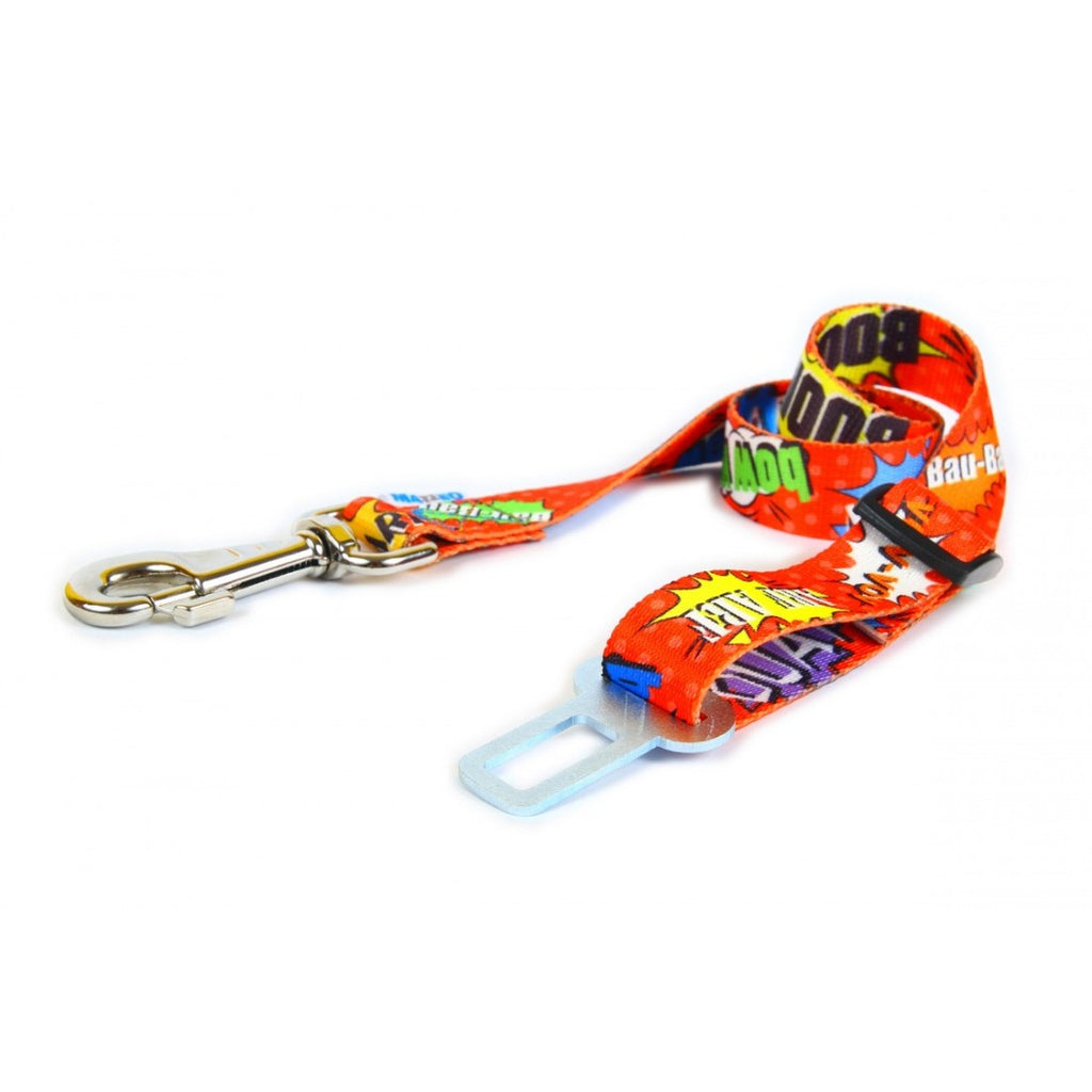 a soft-focused close-up of a red graffiti dog seatbelt, gently securing a calm pet in a cozy car interior