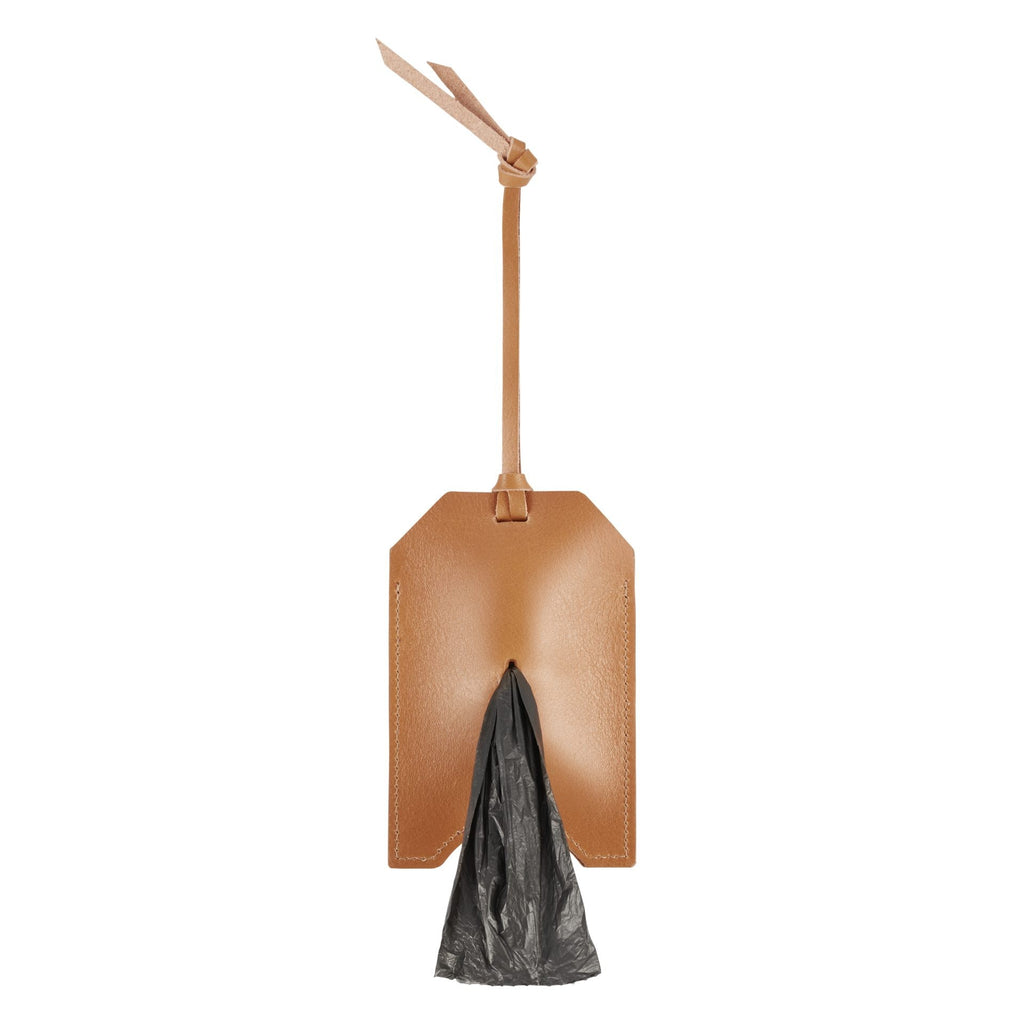 bold close-up of a camel leather dog bag dispenser with rich texture and elegant stitching