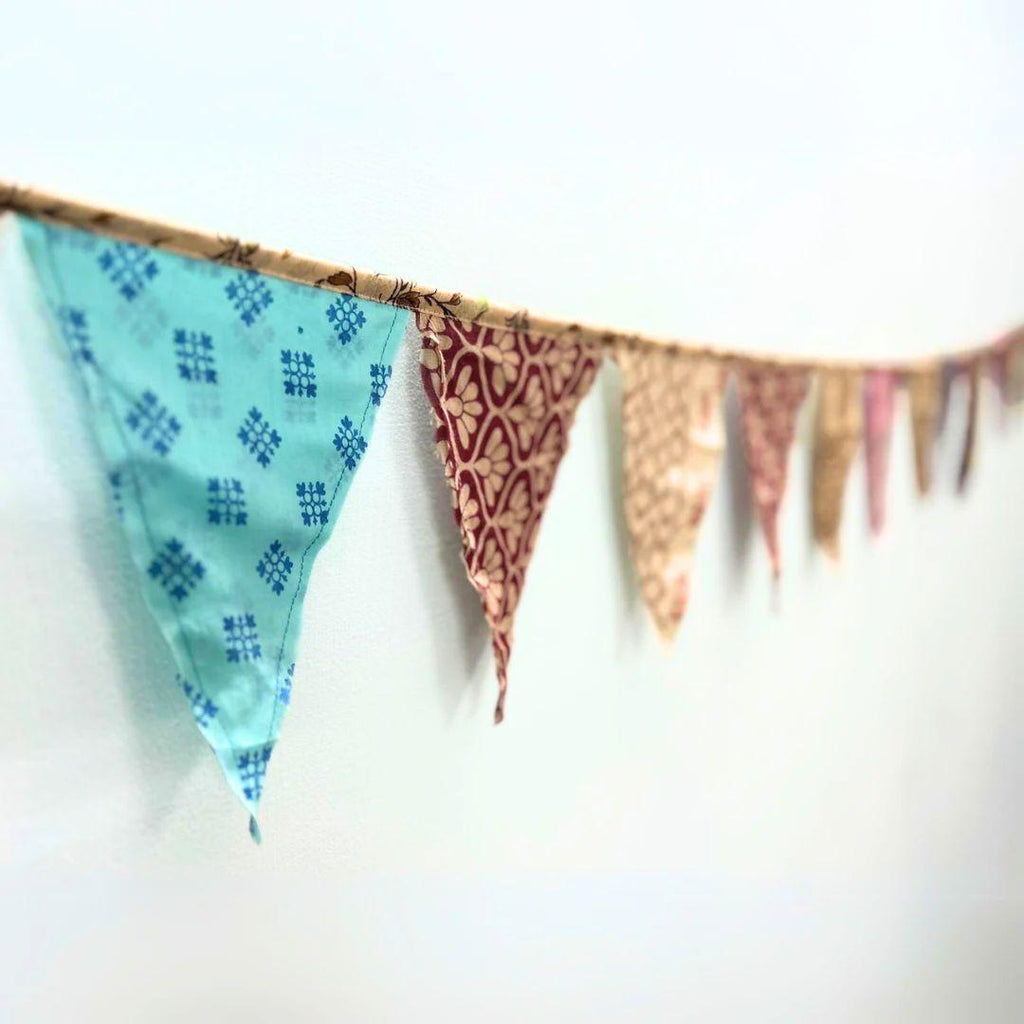 Upcycled sari flags, reusable sari bunting
