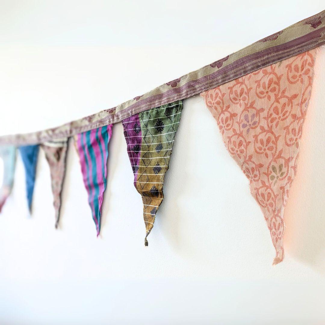 Upcycled sari flags, reusable sari bunting
