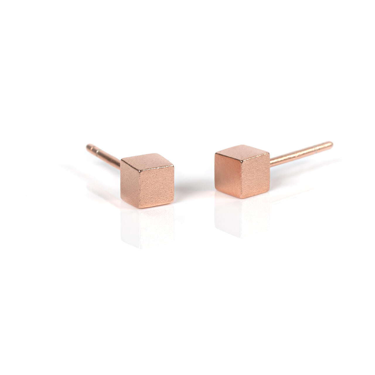 bold satin cube earrings in rose gold and silver, a confident statement gift for her