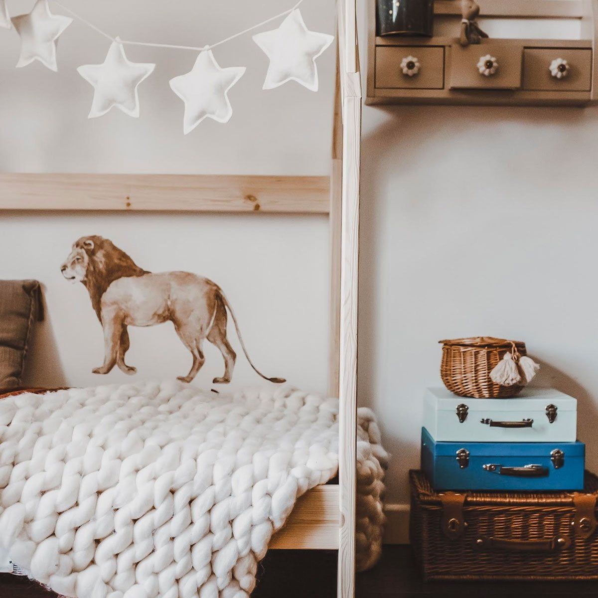 a close-up of the savanna wallstickers set showing the lion dad and cub in soft pastel botanical style