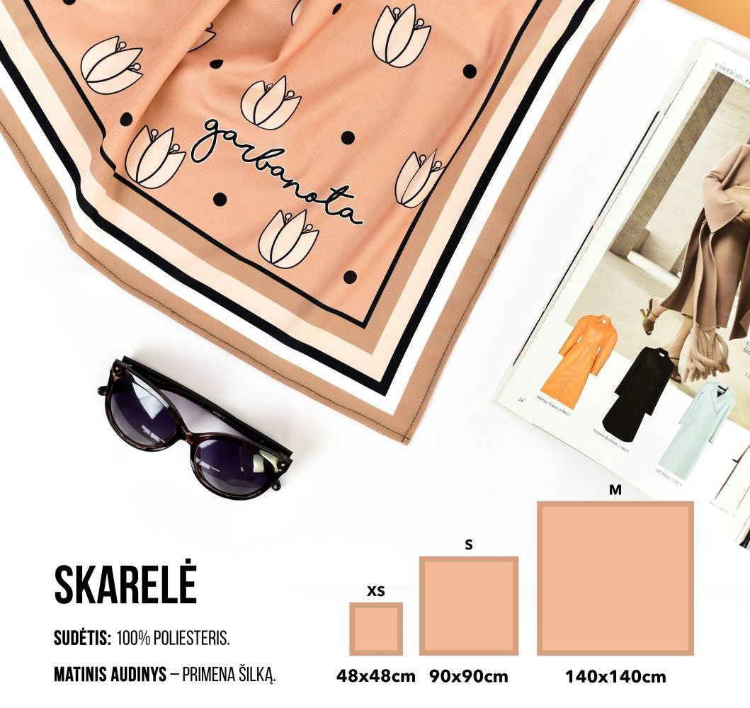 elegant leopard print silk scarf draped gracefully over a model's bare shoulder