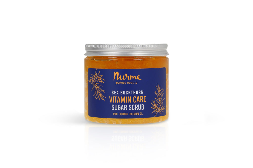 bold close-up of revitalizing sea buckthorn and orange sugar scrub in a jar