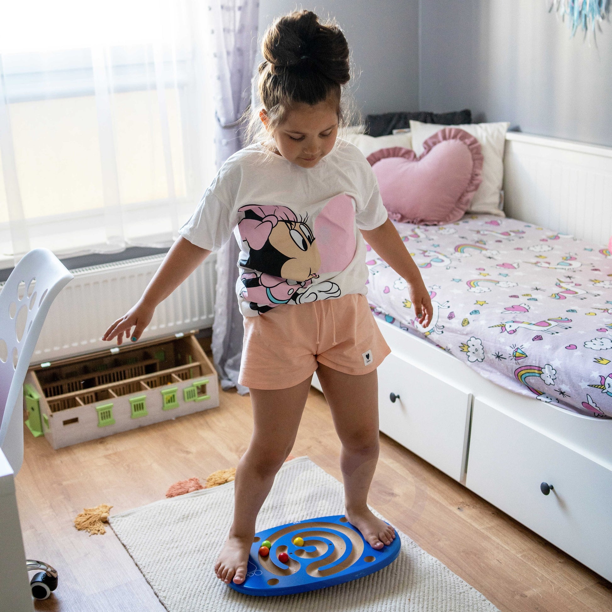 bold wooden balance board with maze track and bright balls for active kids to master coordination