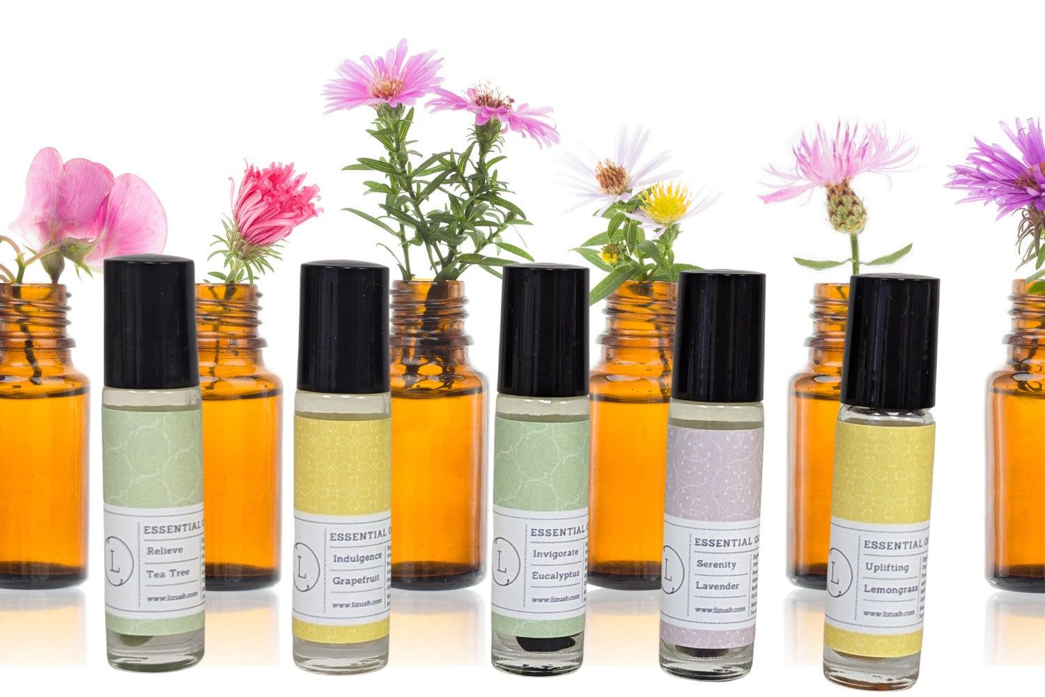 five crystal-infused essential oil roll-ons in a white gift box, a functional and practical self-care set for women