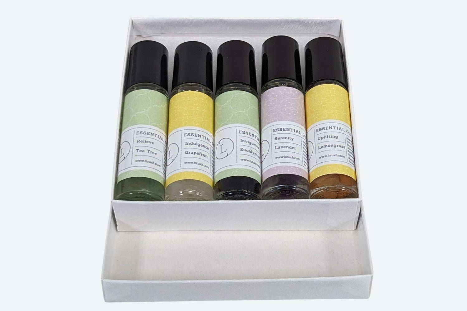 functional set of five crystal-infused essential oil roll-ons for daily wellness