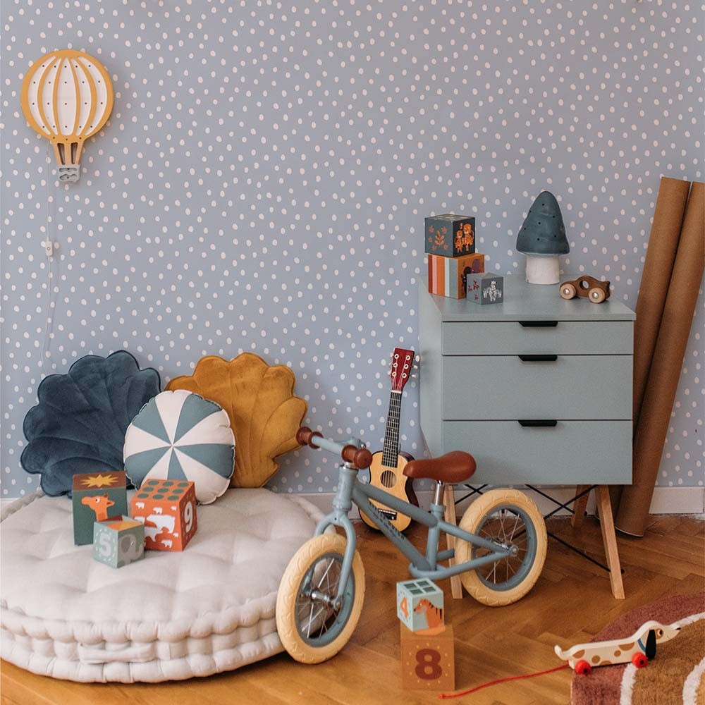 bold light blue irregular dots wallpaper for a contemporary kids room decor statement