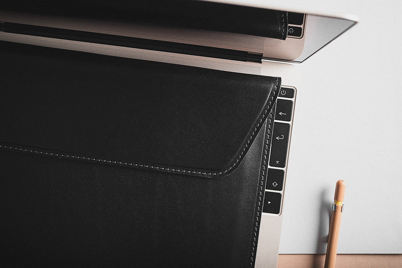 softly lit slim note sack in a cozy home setting, open to show its plush interior