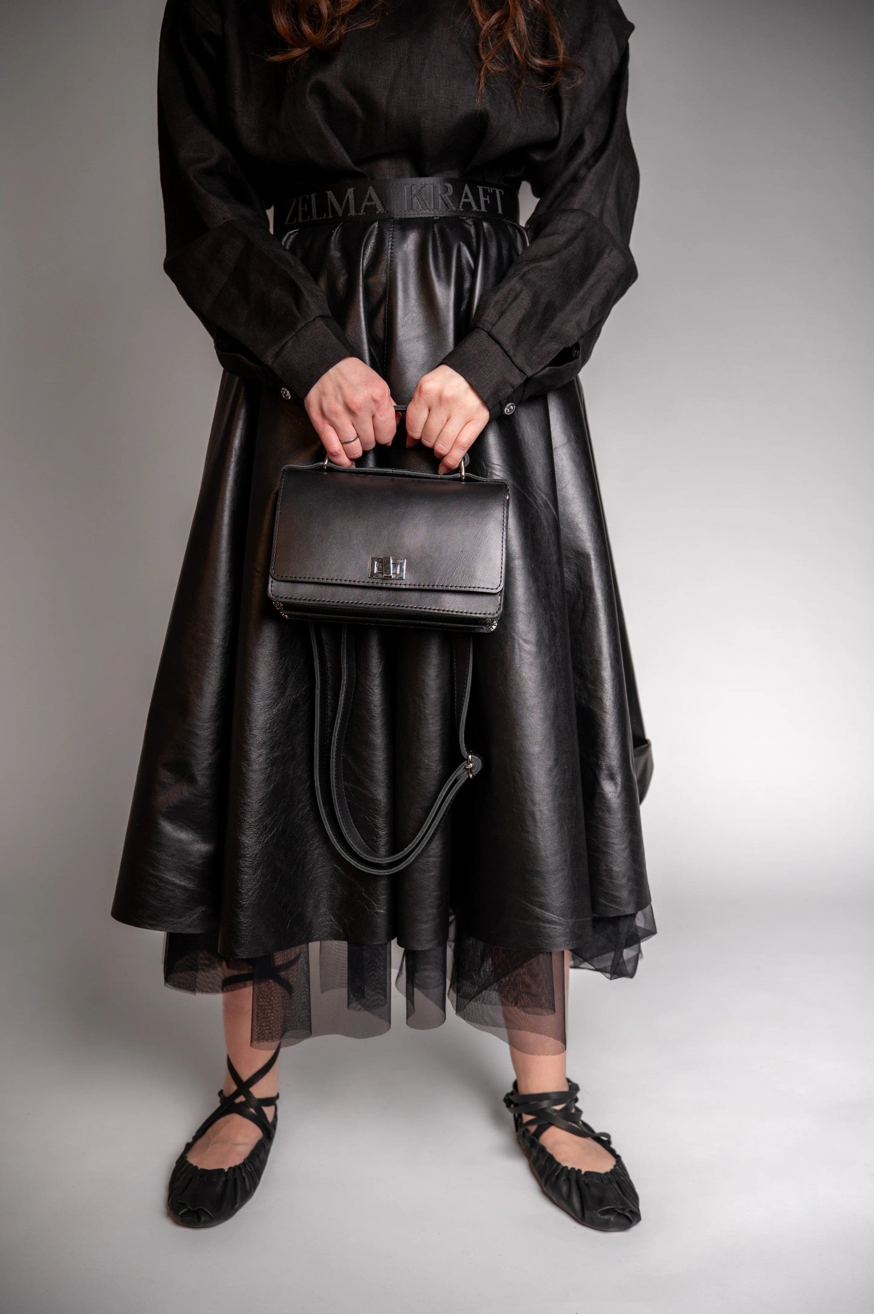 Everyday Elegance: Compact & Premium Leather Briefcase with Adjustable Strap - Handcrafted in Latvia by Zelma Kraft at www.brixbailey.com