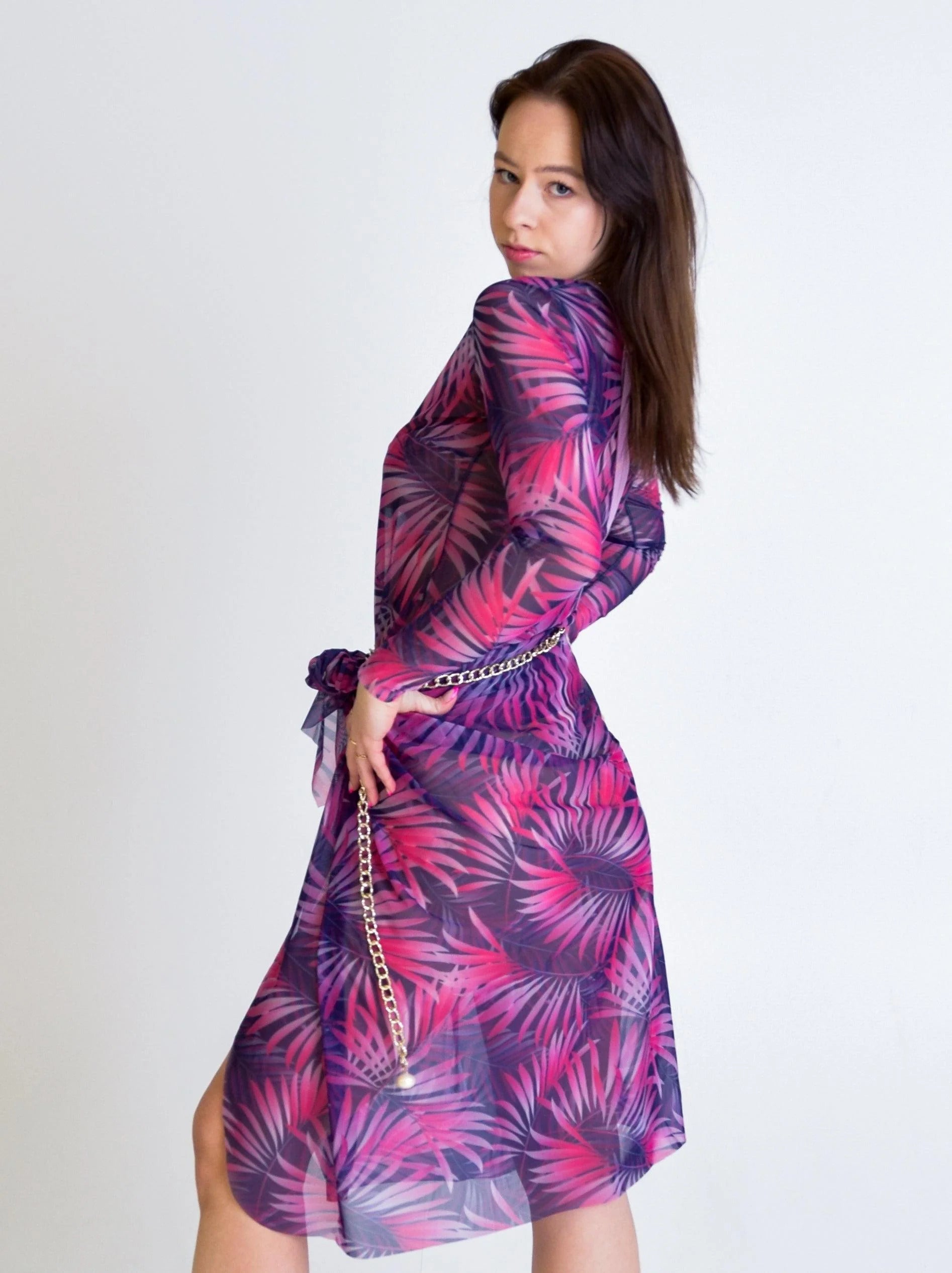 The SMARTTAN Pink Tropics Tan Through Sarong - Ultimate Beachwear Fashion with Innovative UV Protection by Smarttan at www.brixbailey.com