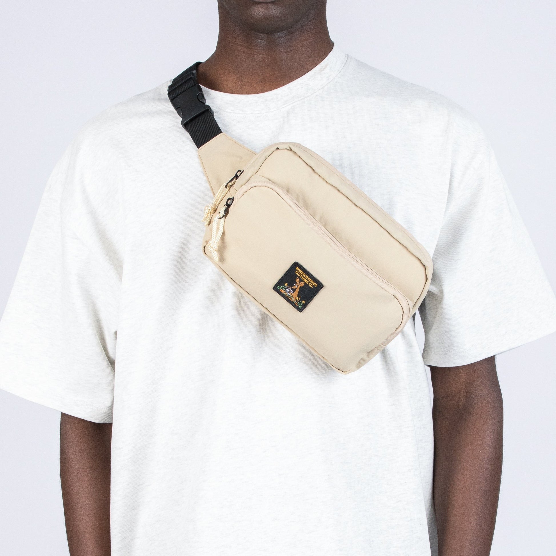 bold front view of the chic sniff moomin waist bag in beige with clear character detail