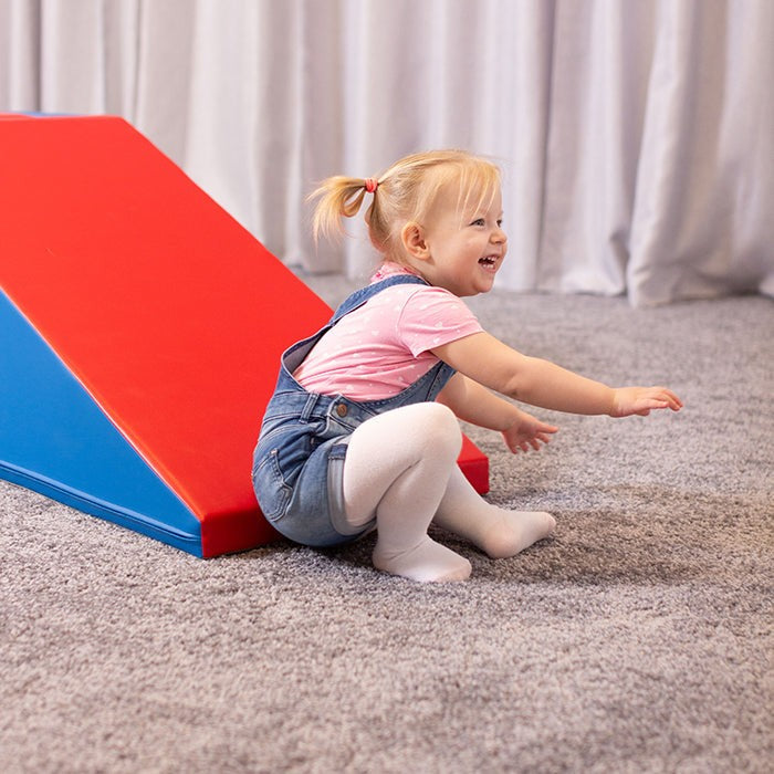 functional iglu soft play step and slide set in a bright playroom setting