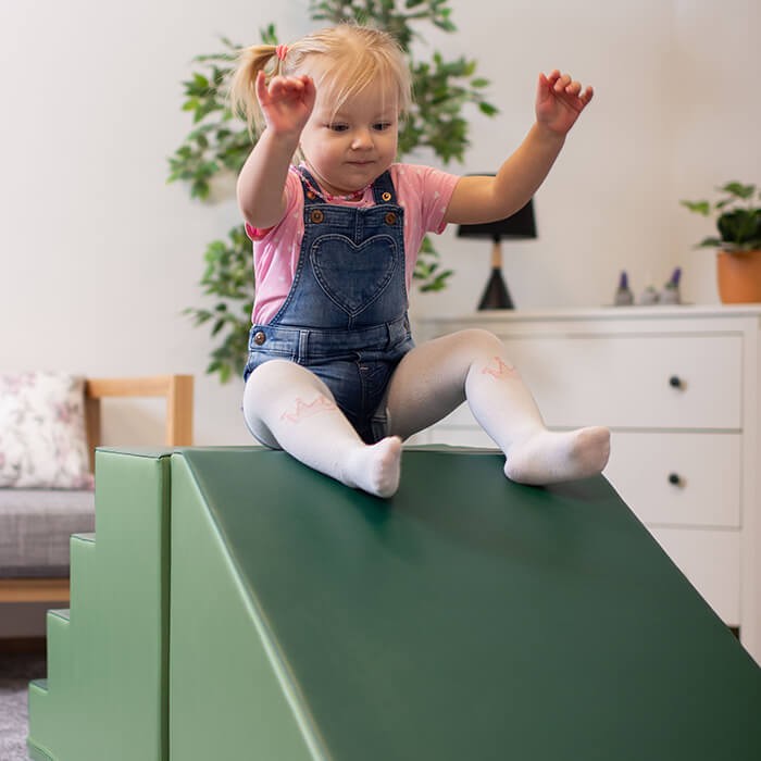 iglu soft play step and slide set in a bright playroom showing the easy-to-clean eco-leather surface