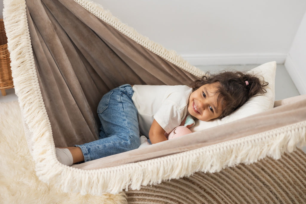 Feather Dream Hammock for Kids - Magical & Soothing Child-Friendly Design Handmade in Poland by Sówka at www.brixbailey.com