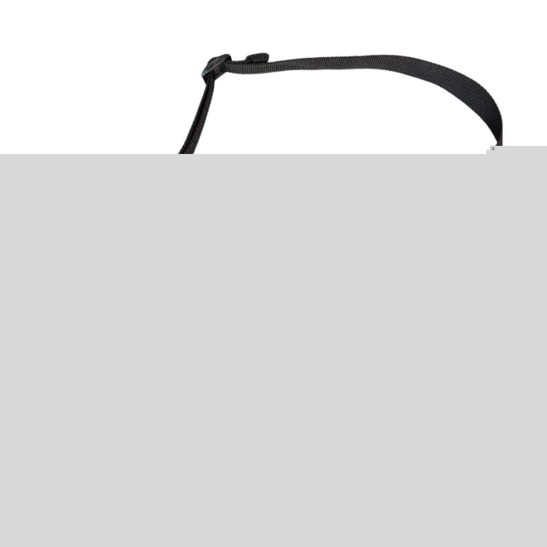 softly lit handmade waist bag in a cozy home setting with an adjustable strap