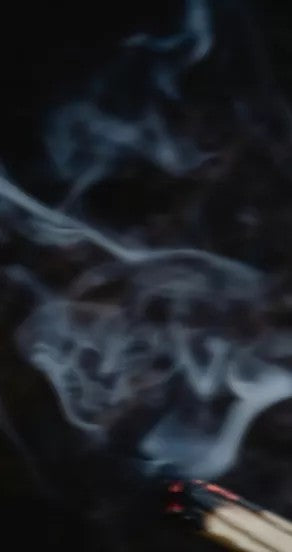 temple of sensus 15ml and 50ml perfume spray bottles on a clean surface