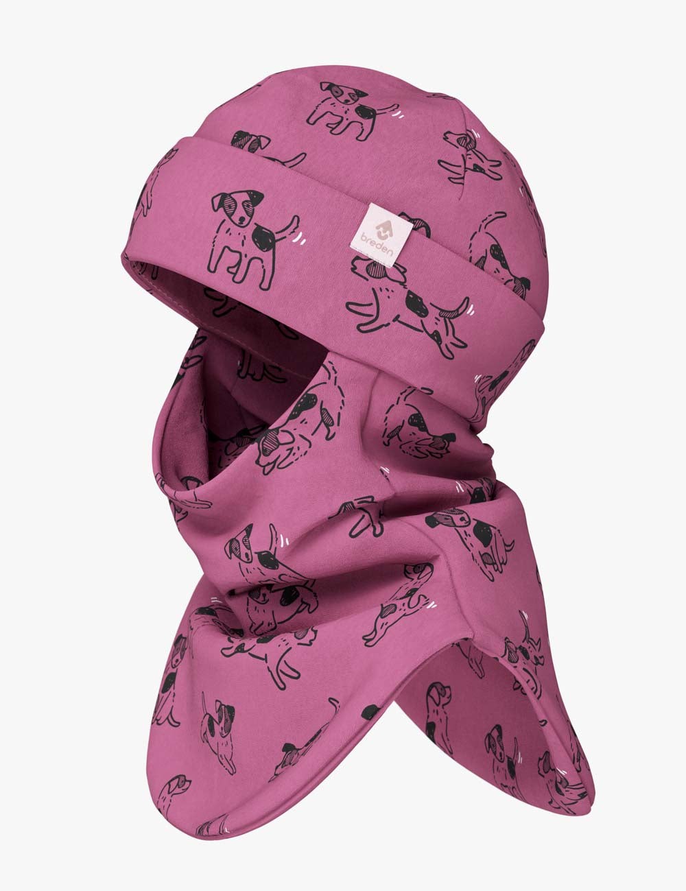 bold close-up of a pink dogs balaclava on a child in dramatic morning light
