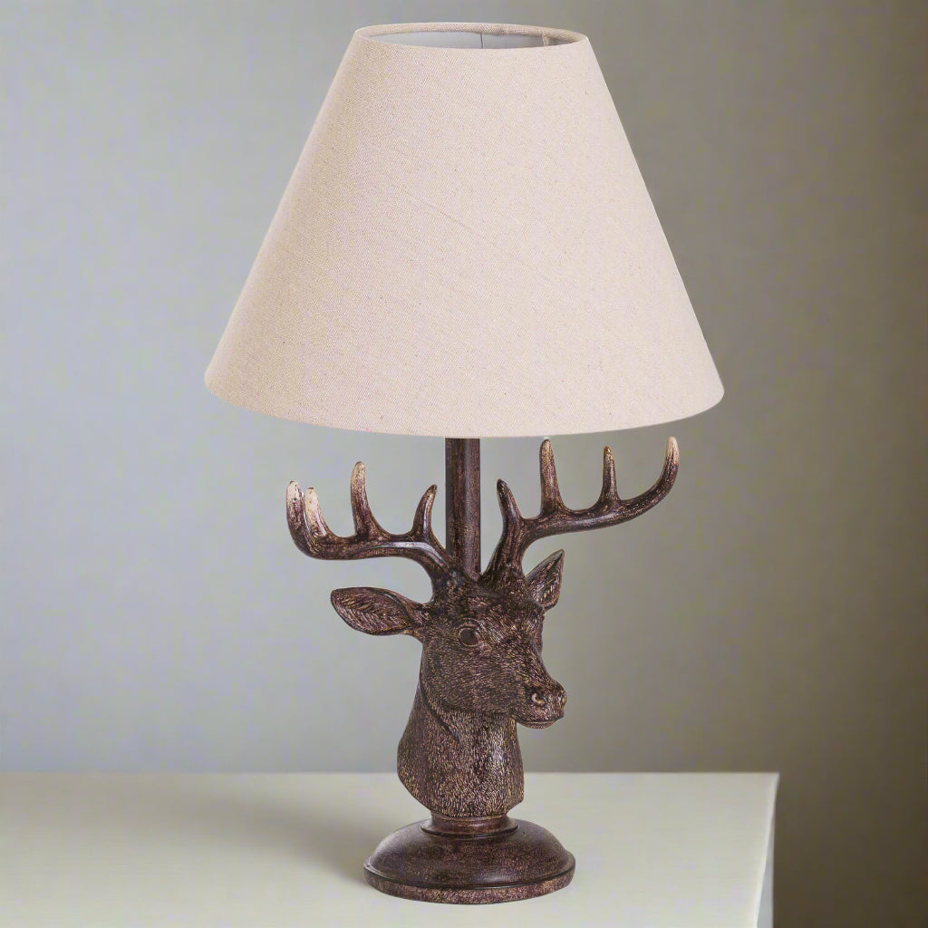 Handcrafted stag head table lamp with antique bronze resin base and natural linen shade, rustic home decor  by RoomLondon at brixbailey.com