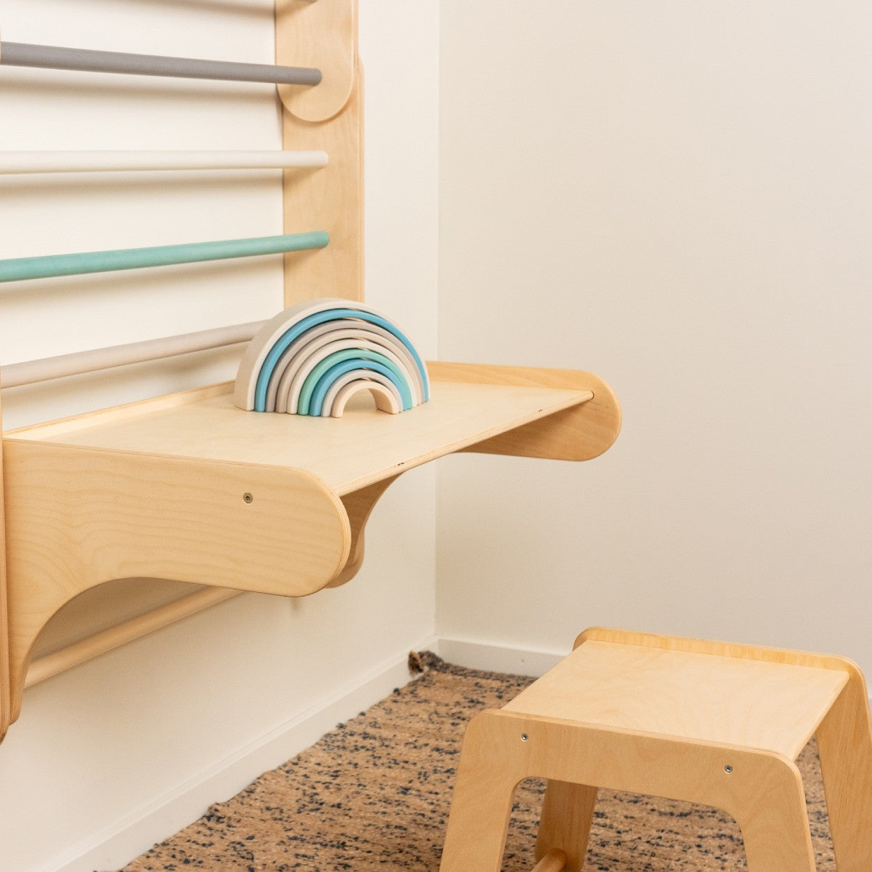 a child's imaginative play with the birch plywood climbing table and chair set