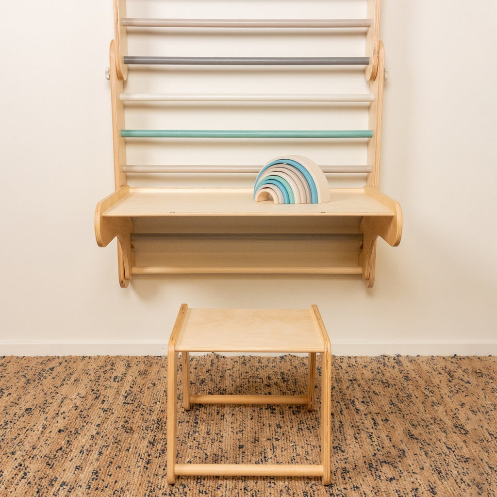 a child's imaginative play with the birch plywood climbing table and chair set