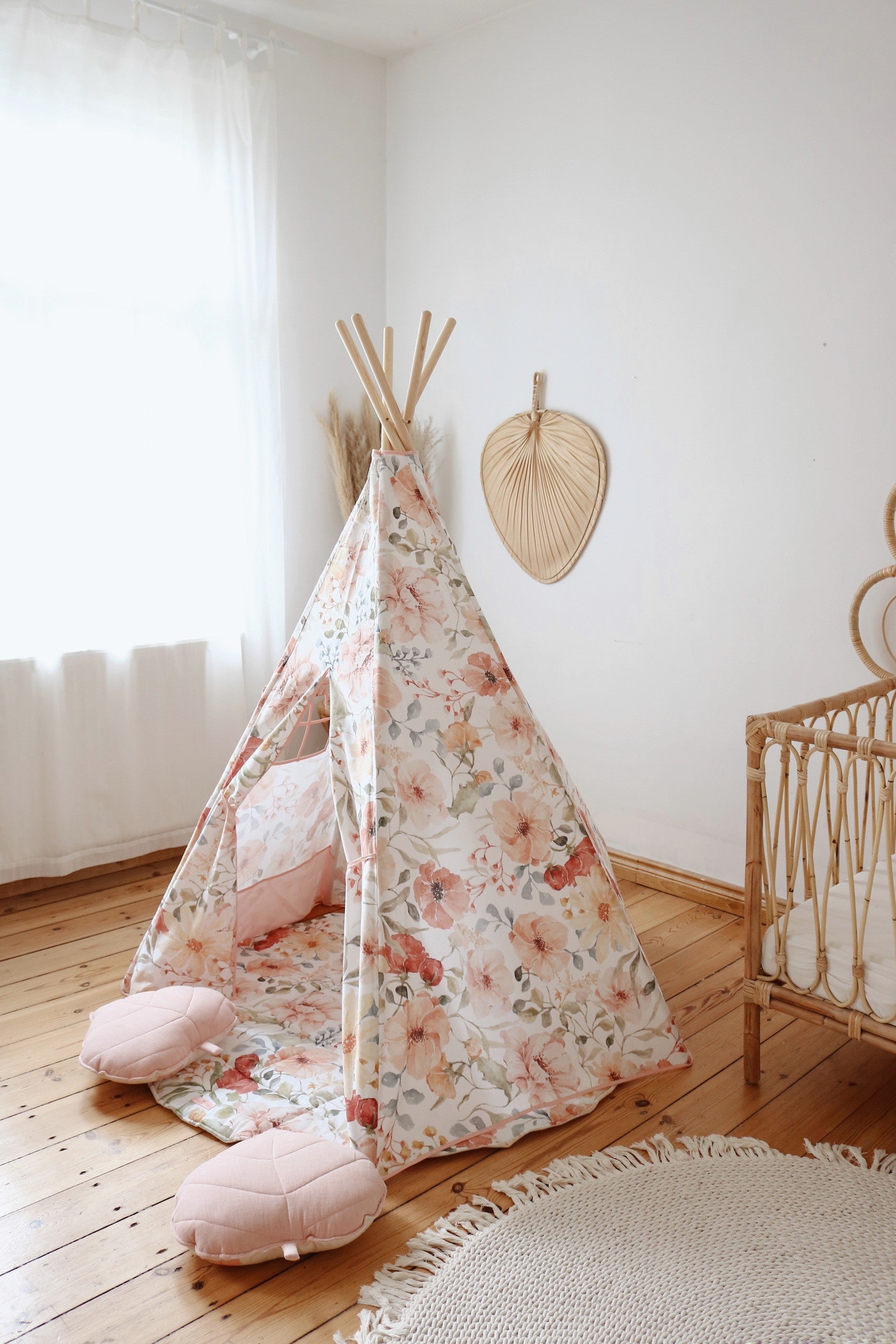 softly lit kids cotton teepee tent with a cozy interior view and floral patterns
