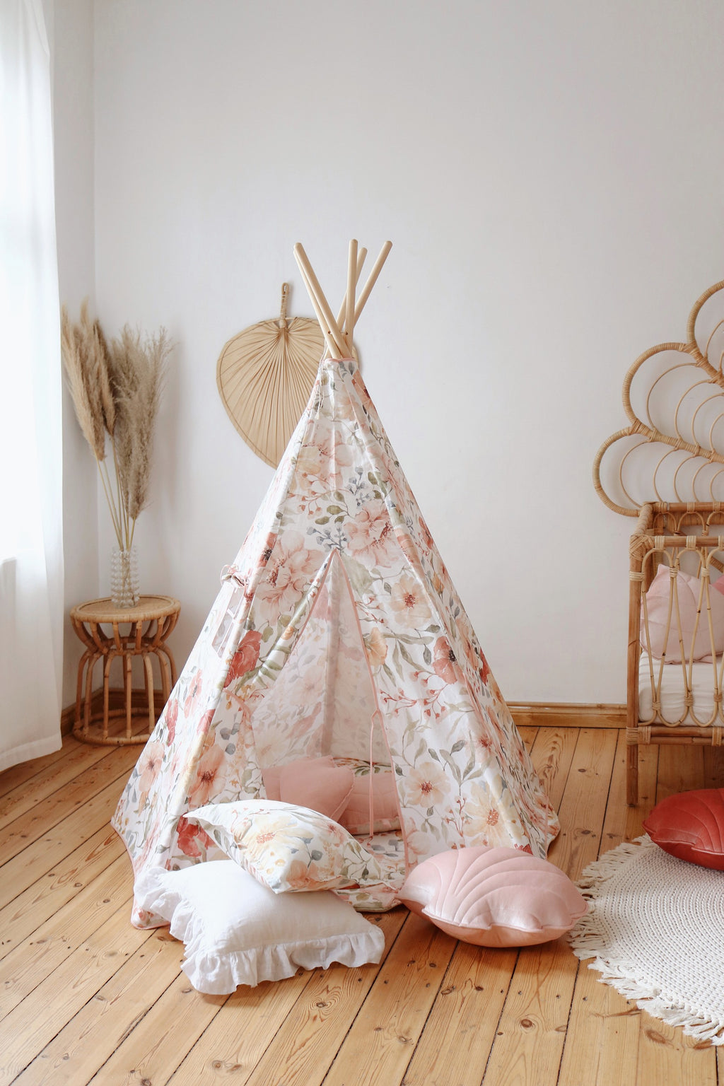 functional flower power teepee tent setup in a bright playroom with storage pocket visible