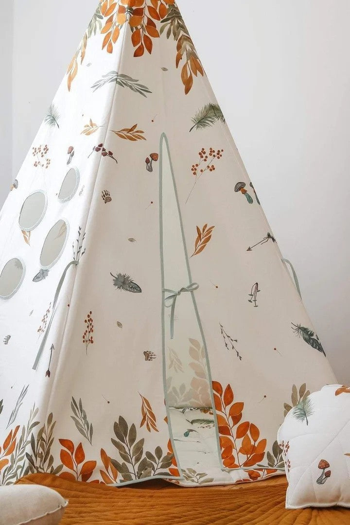 folded forest friends teepee tent in its cotton storage cover, ready for convenient travel or tidy storage
