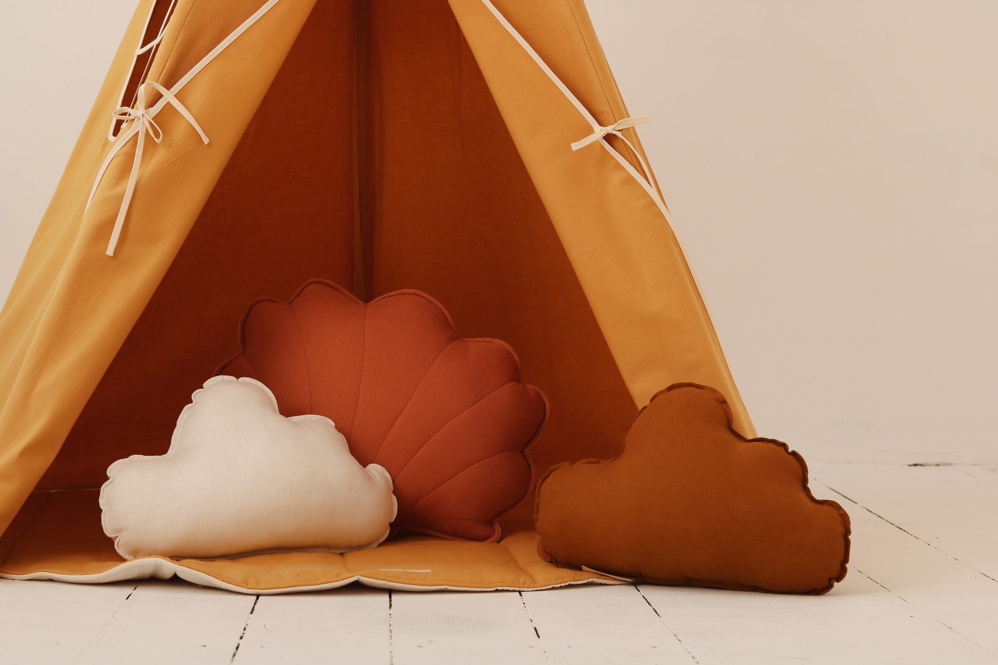 elegant handmade orange kids teepee tent with pine poles, a sophisticated play space for imaginative adventures