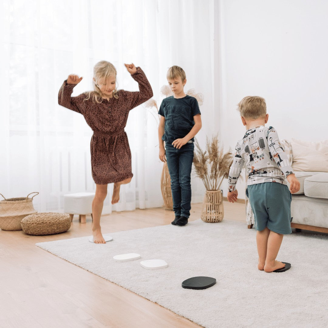Tipi Stepping Stones - Enhance Coordination & Family Fun with Natural or Grey Wood Sets by Ette Tete at www.brixbailey.com