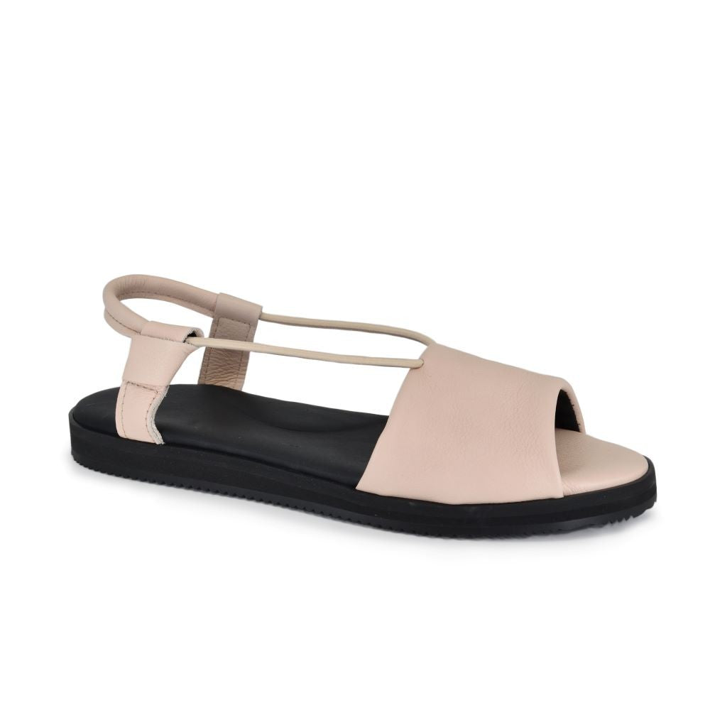 elegant nude toku berlin sandals in soft studio lighting highlighting the premium leather and refined silhouette
