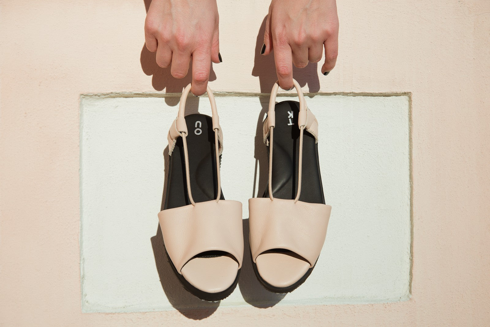 side view of toku berlin sandals showing the flexible eva rubber outsole and leather construction