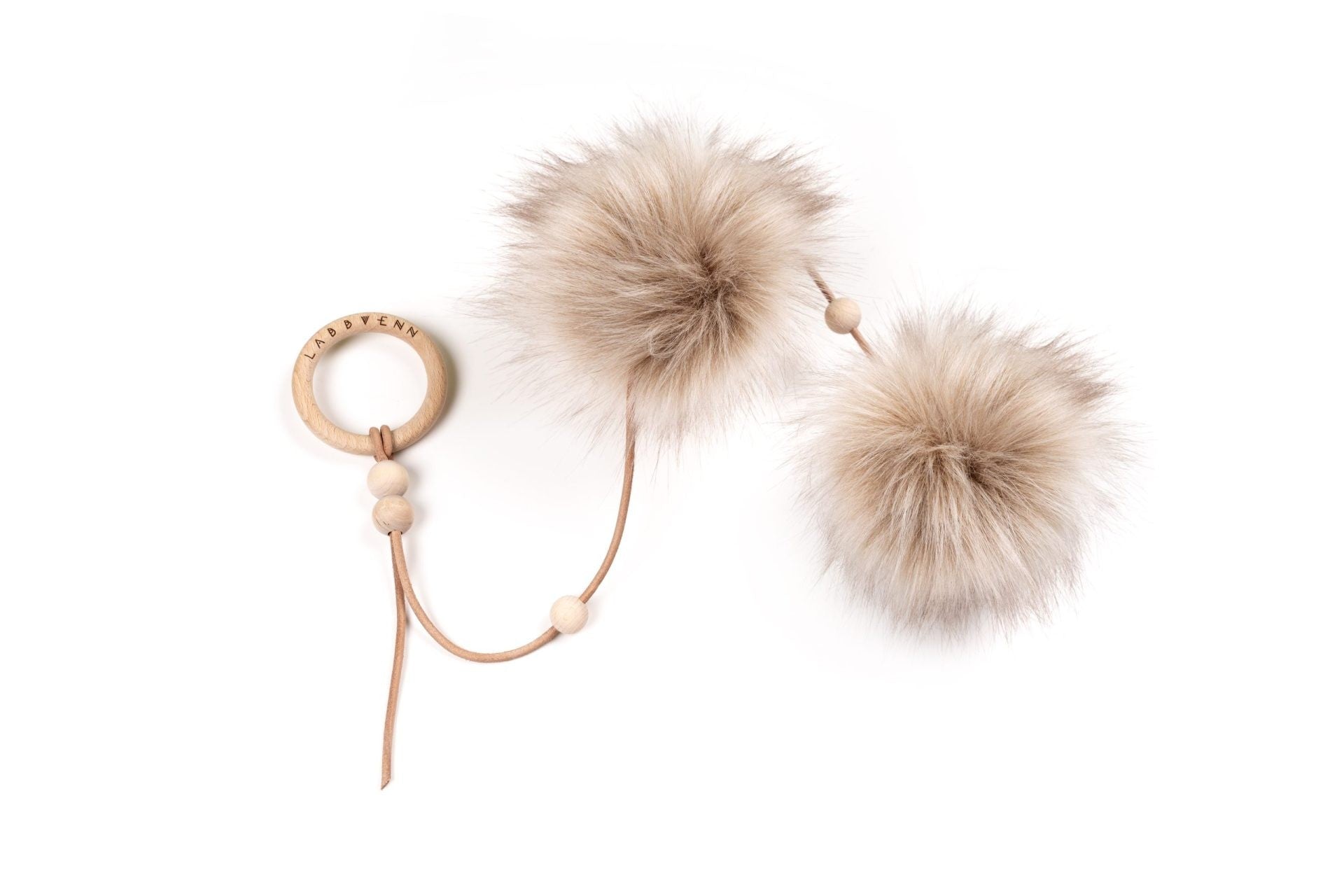 playful cappuccino cat toy with two bouncing faux fur balls on a natural leather wand
