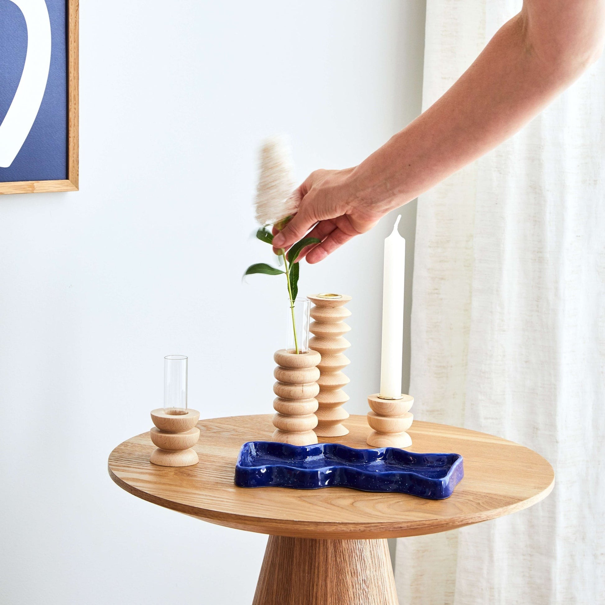 elegant wooden vase with glass insert on a minimalist table in soft morning light
