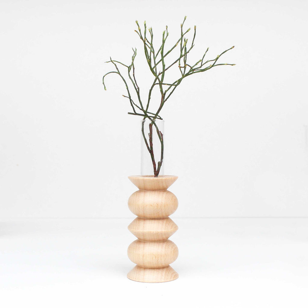 bold modern totem vase in solid beech wood with a sleek glass insert