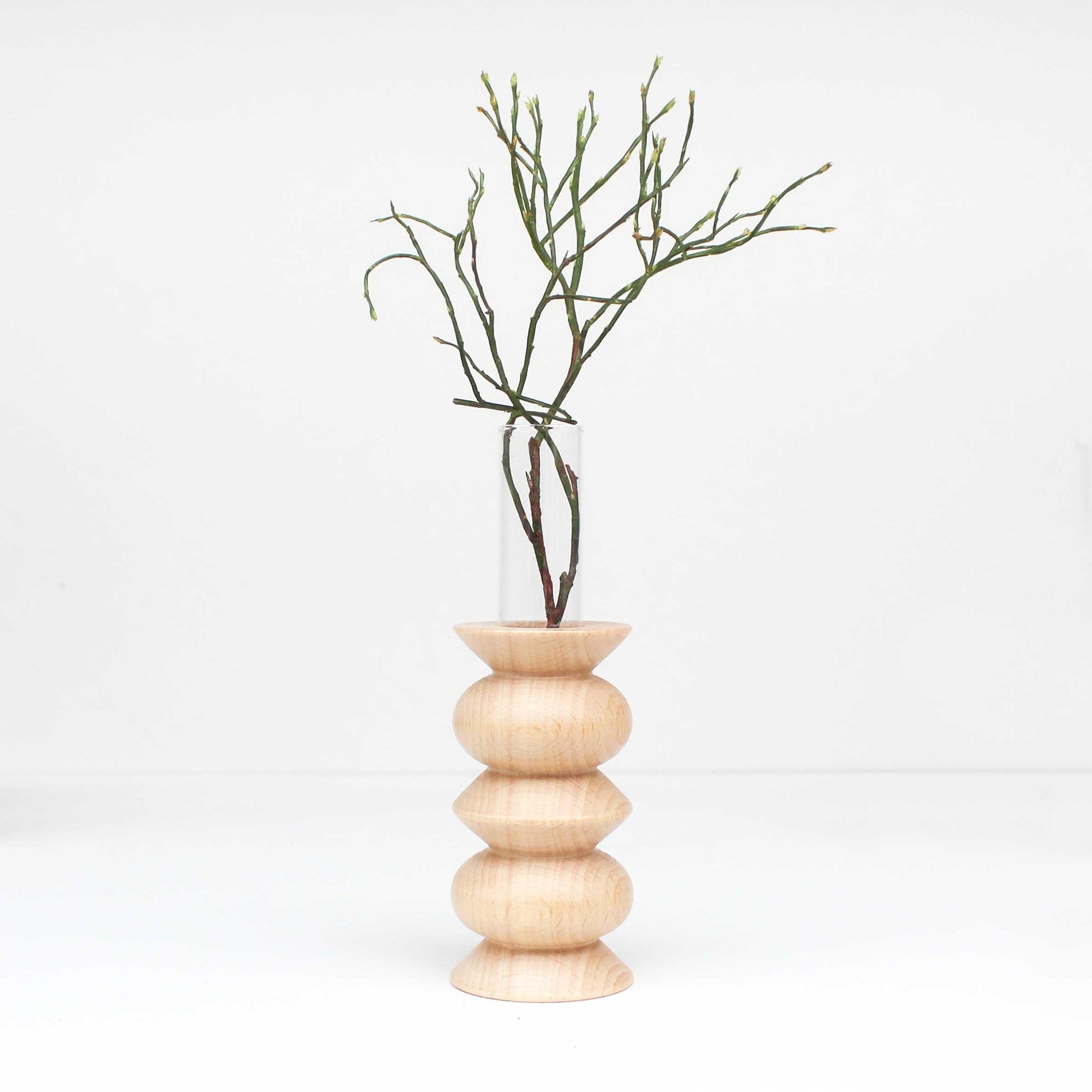 bold modern totem vase in solid beech wood with a sleek glass insert