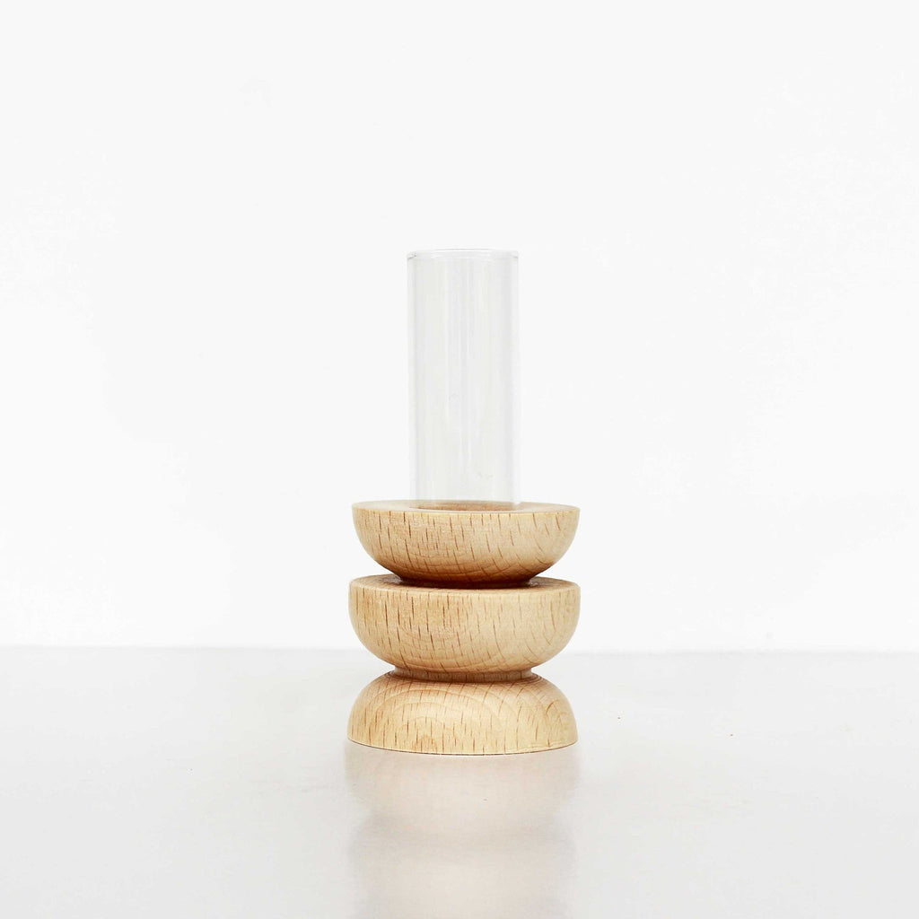 bold modern totem vase in solid beech wood with a sleek glass tube insert