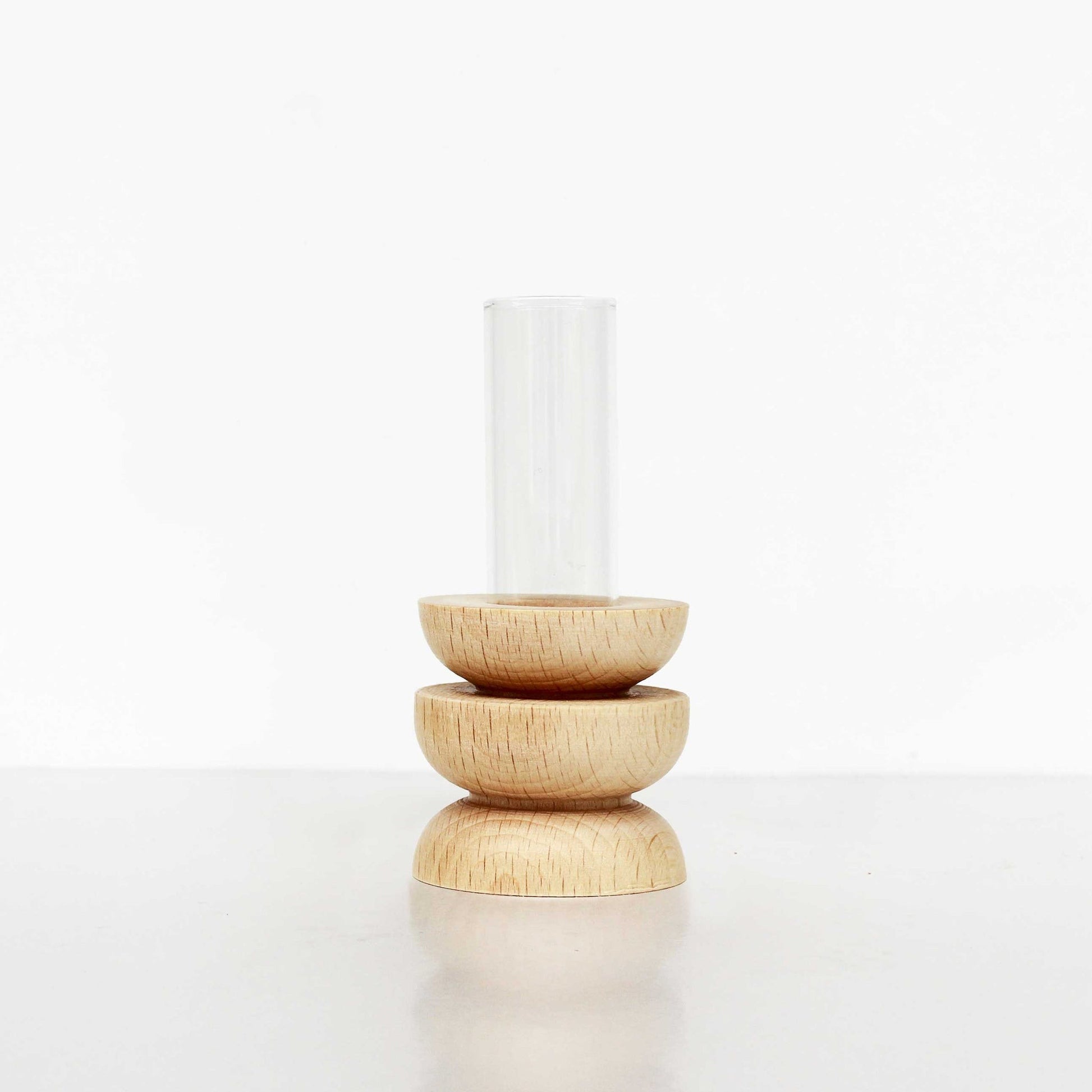 bold modern totem vase in solid beech wood with a sleek glass tube insert