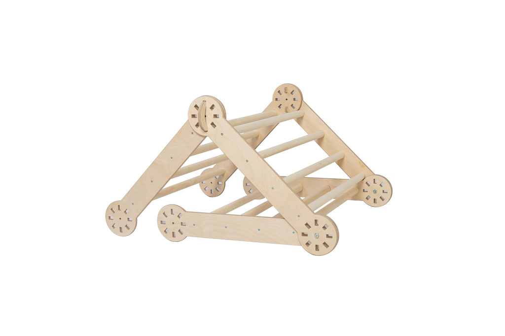 elegant montessori climber in a sunlit playroom, showcasing its refined baltic birch craftsmanship