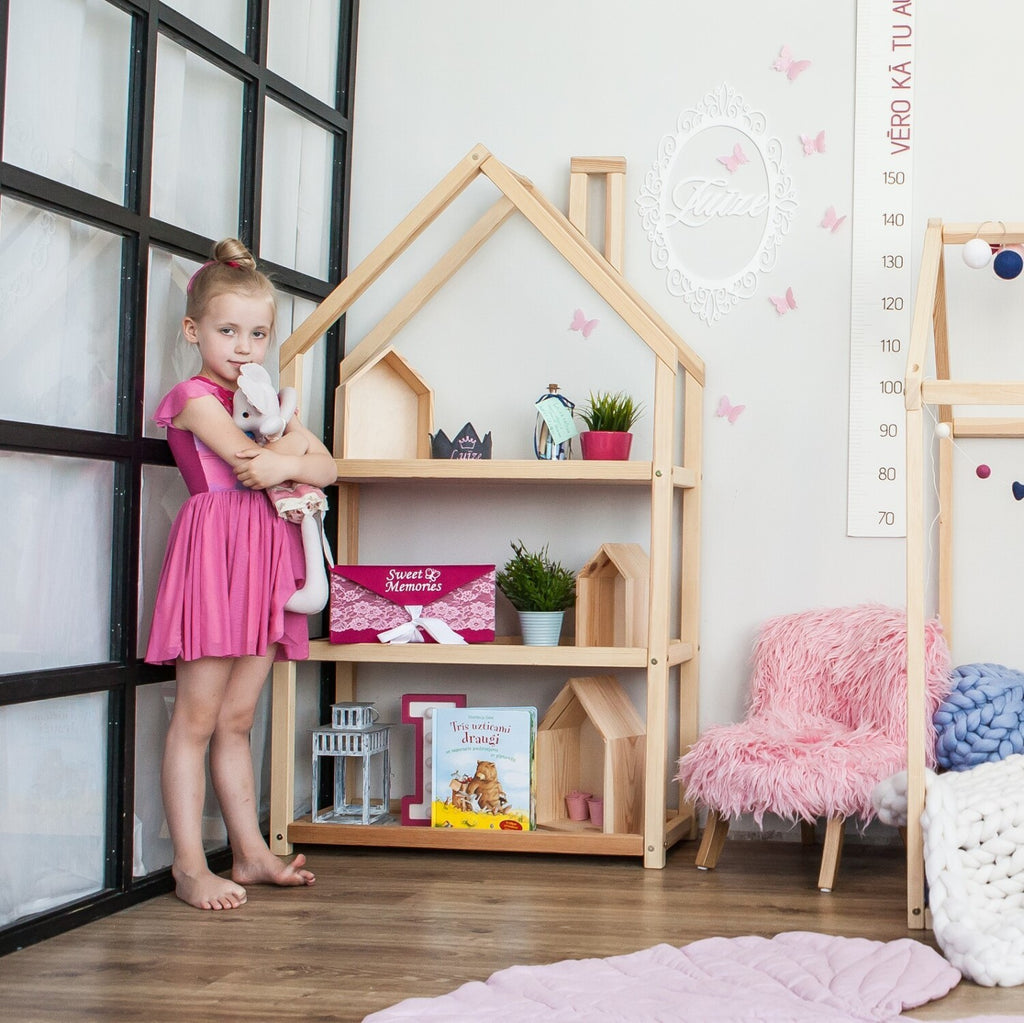 a soft grey house shelf in a cozy nursery with gentle morning light