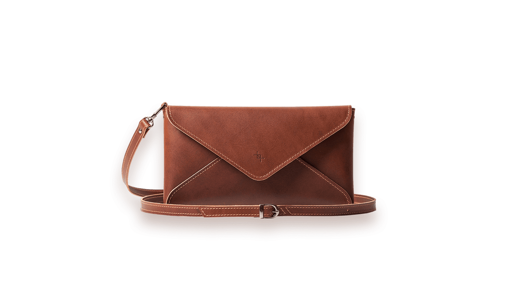 Elegant Model Leather Clutch – Timeless & Versatile by Craftory at brixbailey.com