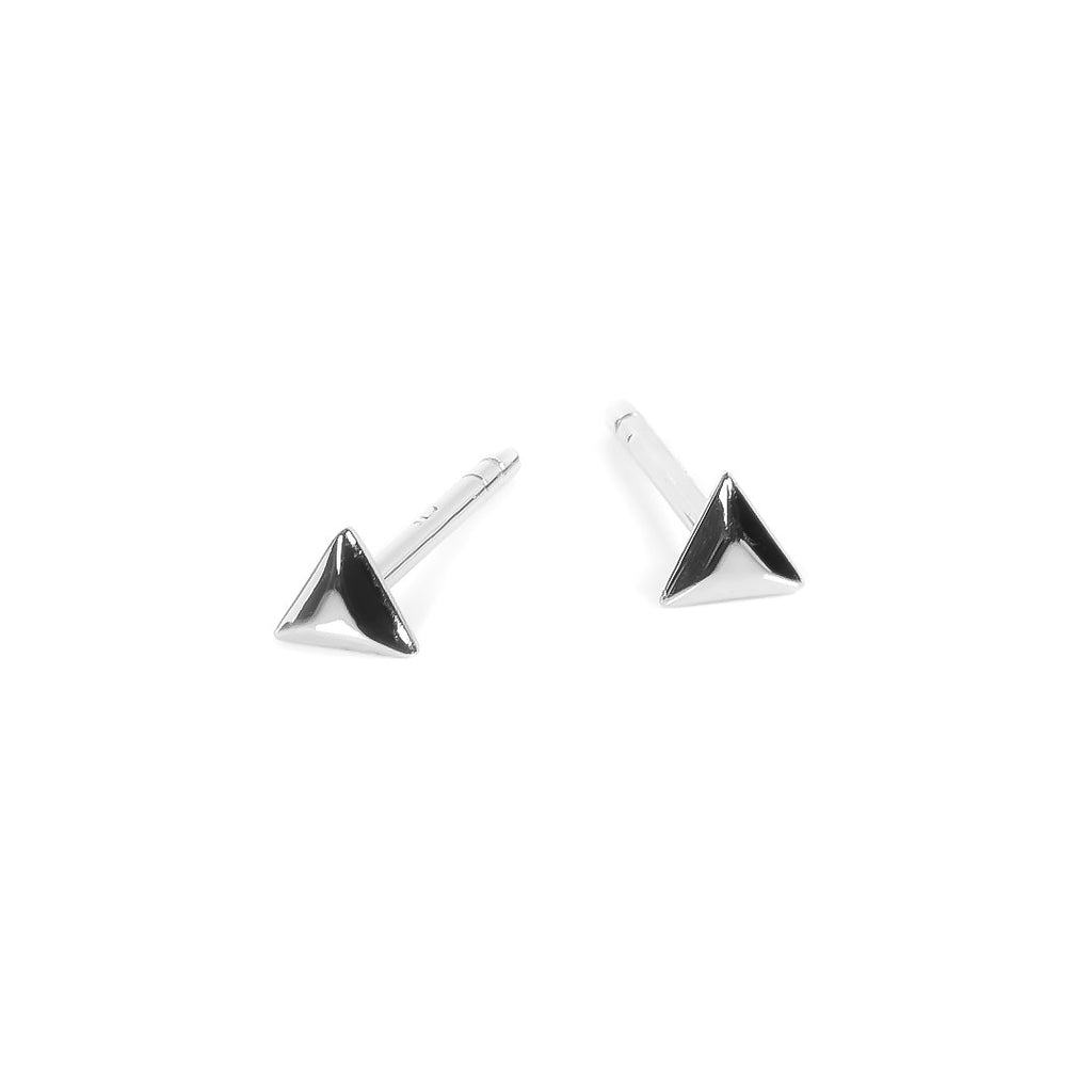 Tiny sculptural triangles, almost like pyramids. 4mm diameter earstuds are made of silver 925. by MyaMoon at www.brixbailey.com