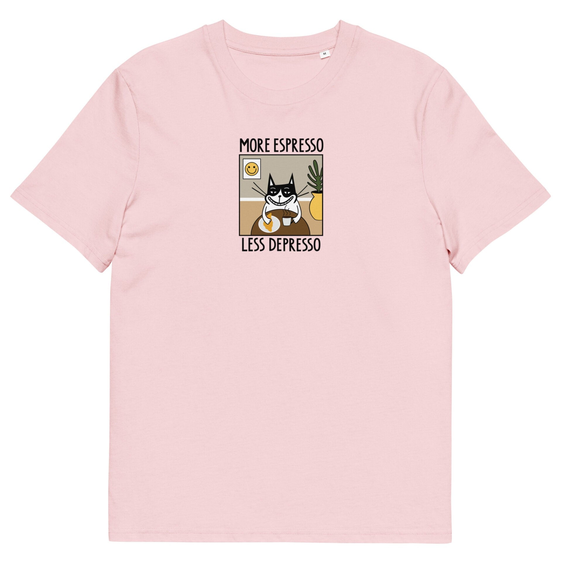 playful close-up of the more espresso less depresso tee on a sunlit cafe table