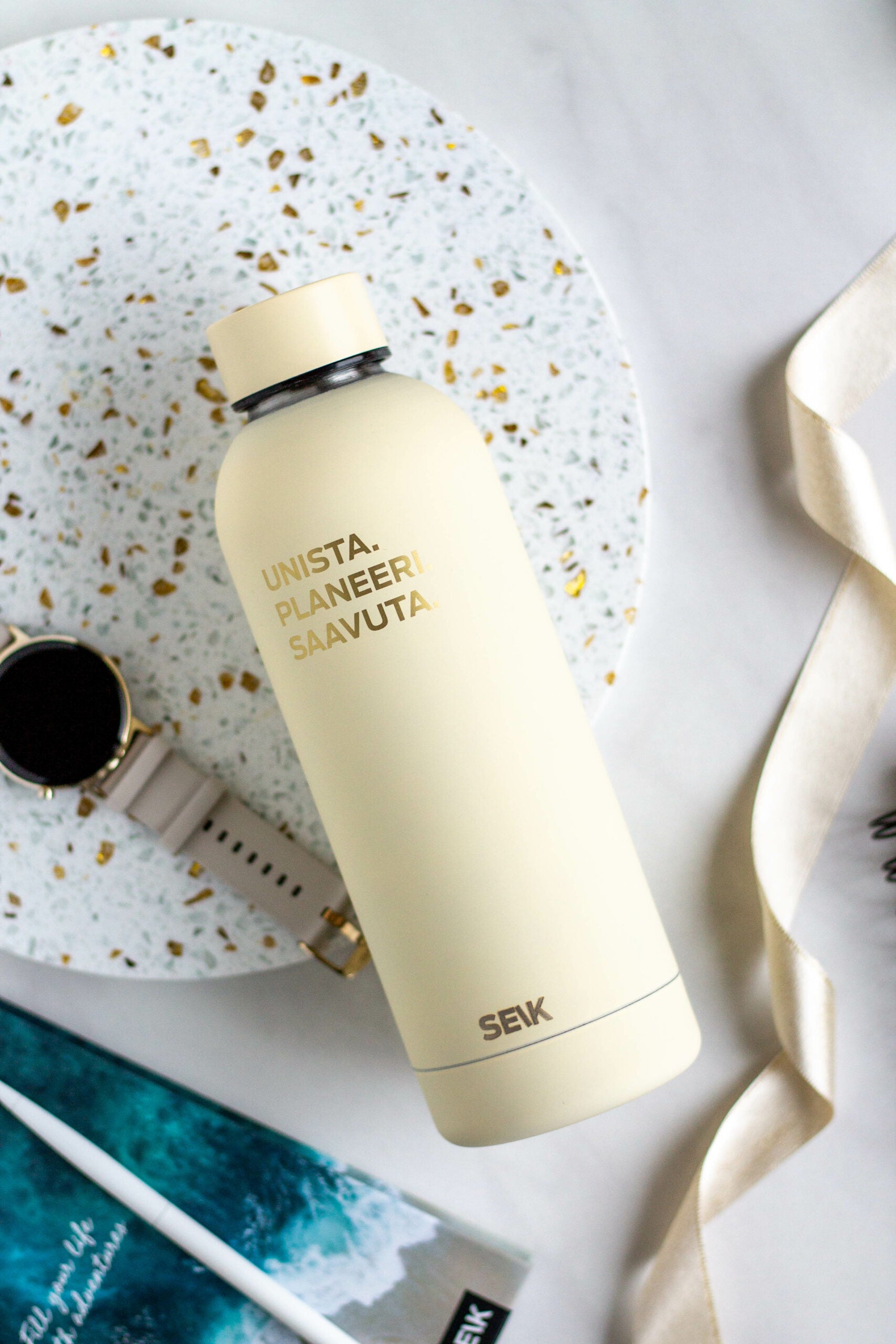 soft morning light on a chic seik unista thermos with a motivational slogan