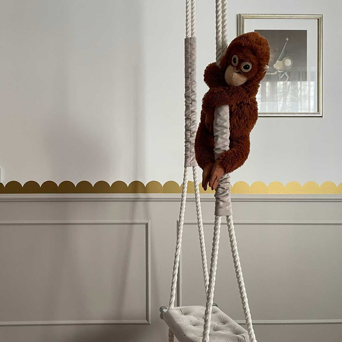 playful golden semicircle wall decals arranged in a fun pattern on a kids room wall