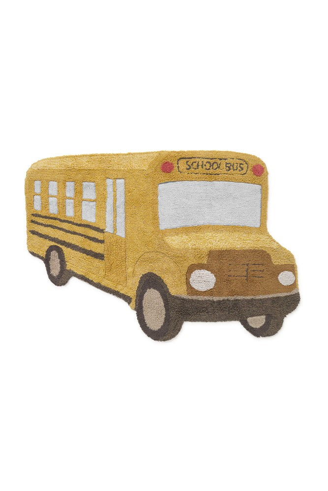 soft cotton school bus rug for kids in a cozy, sunlit playroom corner