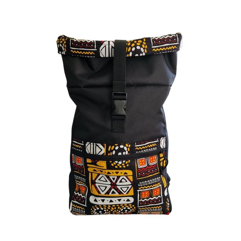 close-up detail of the waterproof yellow patterned fabric and roll-top closure