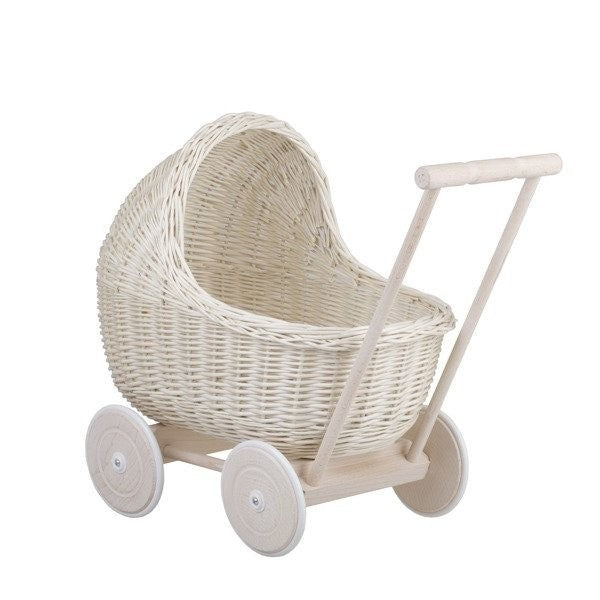 elegant whitewashed wicker doll pram with soft beige bedding in a refined nursery setting