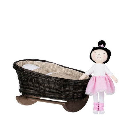 a functional wicker doll cradle with beige bedding, shown from a practical top-down angle